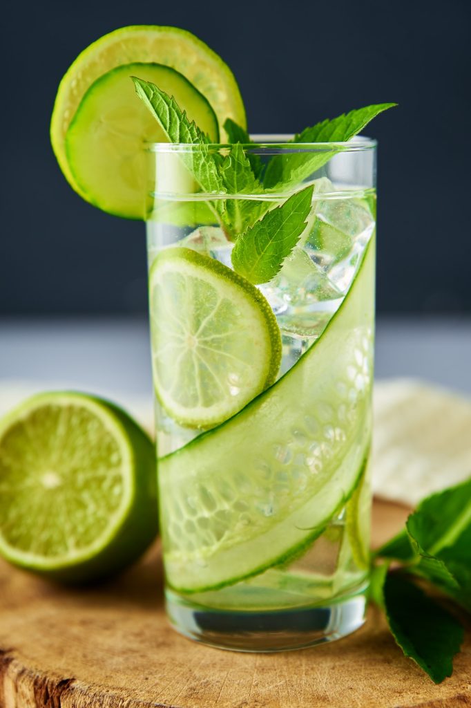 Detox refreshment drink. Lemonade with lime and cucumber